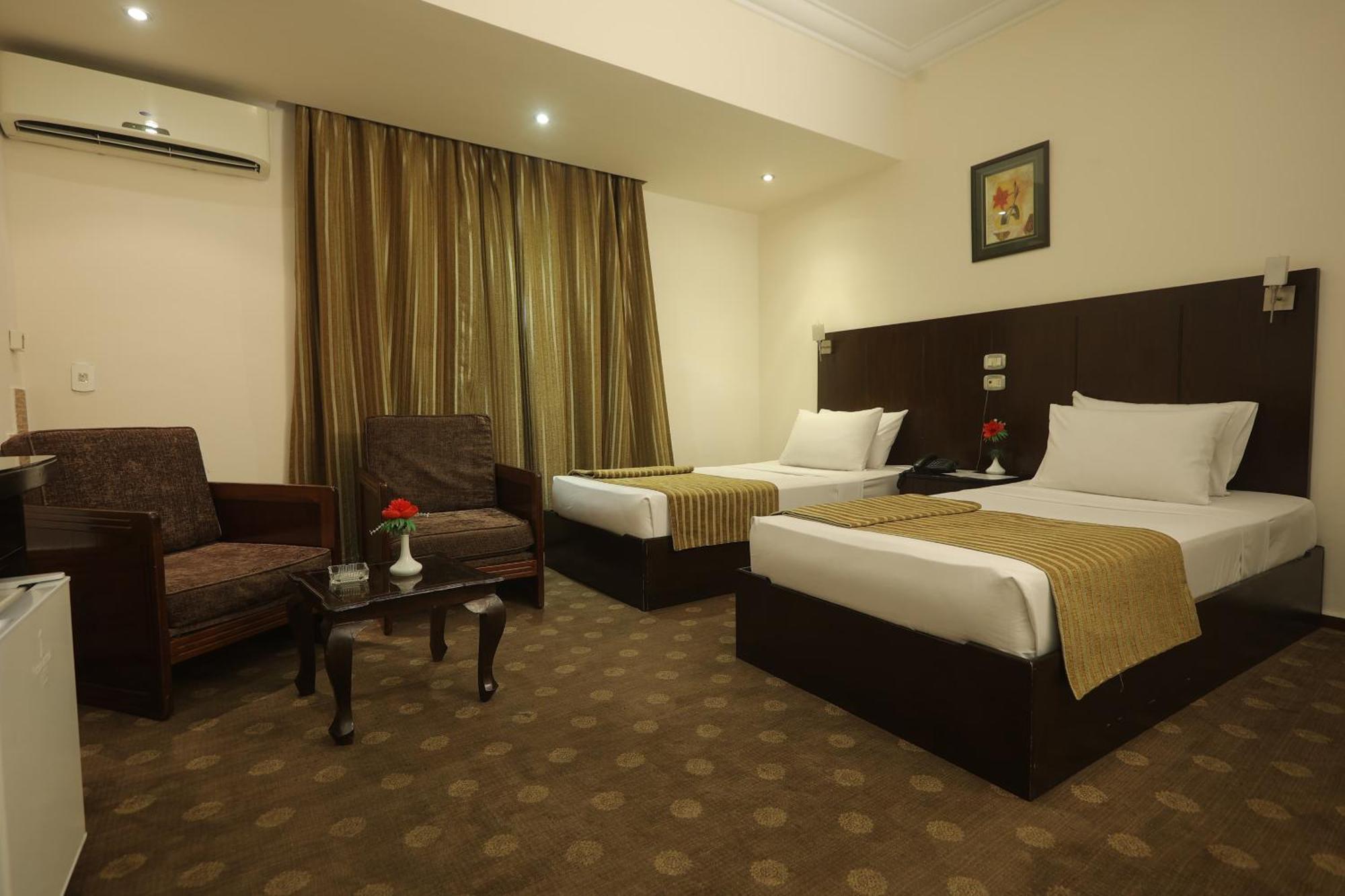 Aura Inn Hotel Cairo Giza Extérieur photo